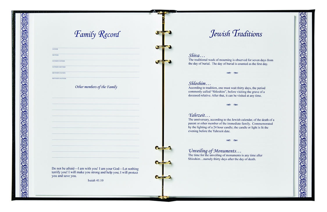 Opened book showing Family Record and Jewish Traditions pages