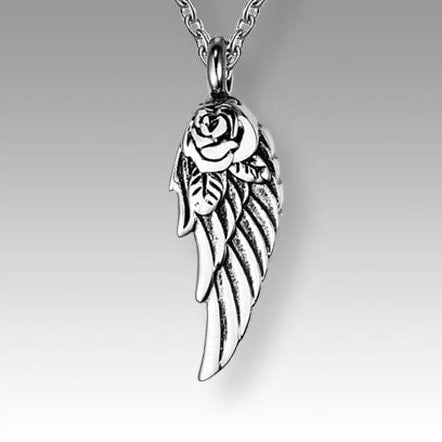 Silver rose and wing pendant