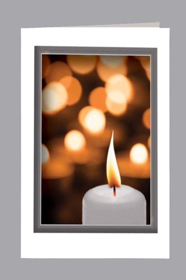 White candle with background of candles church bulletin