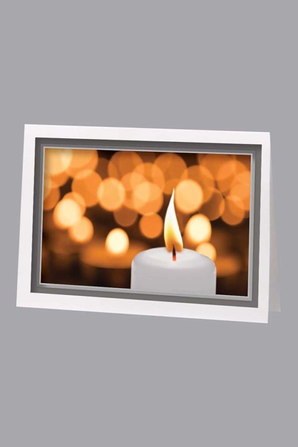 White background with glowing candles thank you card
