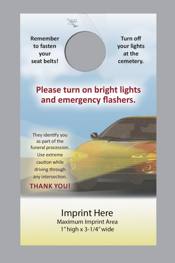 red car headlight and emergency flashers reminder hanger