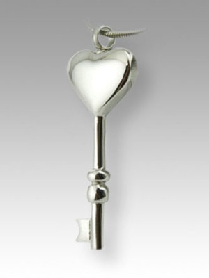silver key with heart pendant