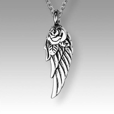 Silver rose and wing pendant