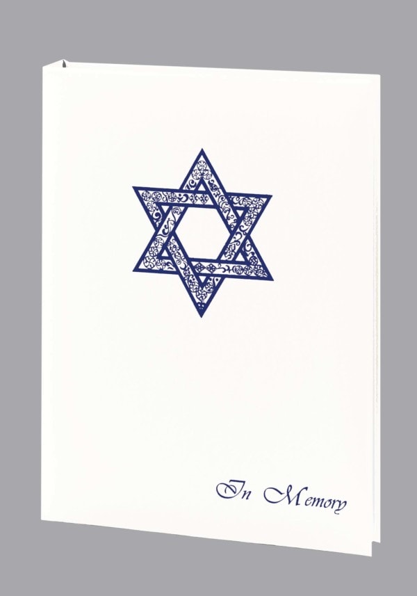 blue foil star of david on white funeral register book